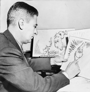 Dr Seuss at work on a drawing of The Grinch for How the Grinch Stole Christmas, 1957