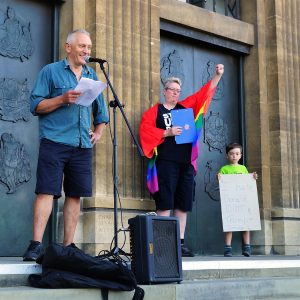 Organiser Julie Bremner alongside Adrian Holmes, Green Party, addressing Norwich Protests Donald Trump