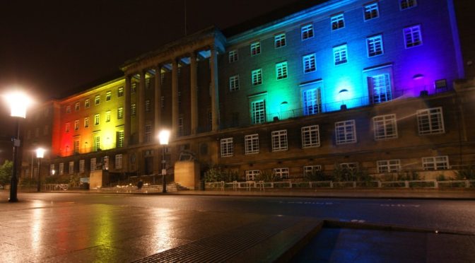 Rainbow illuminated Norwich City Hall during vigil against hate for Orlando Pulse Gay Bar shooting